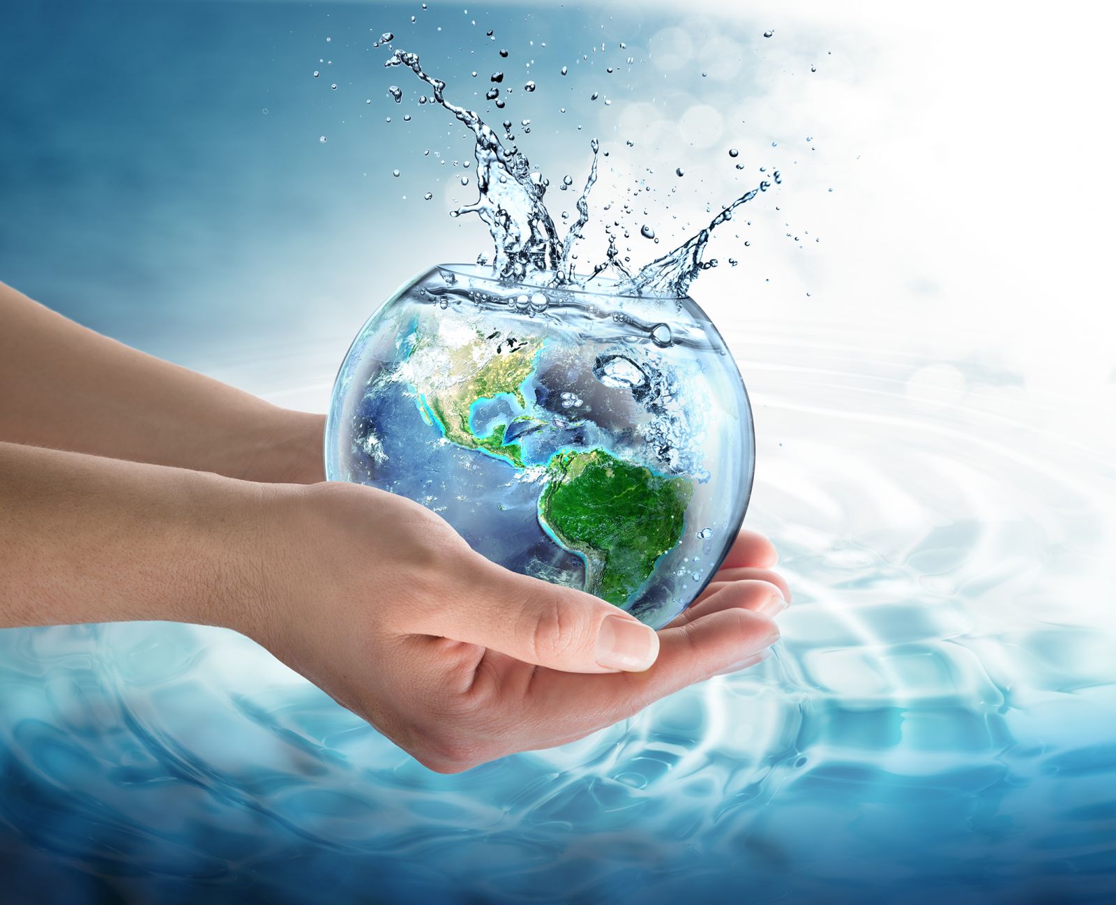 hands holding fishbowl with planet graphic inside